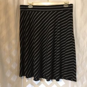 Black and white diagonal striped skirt.